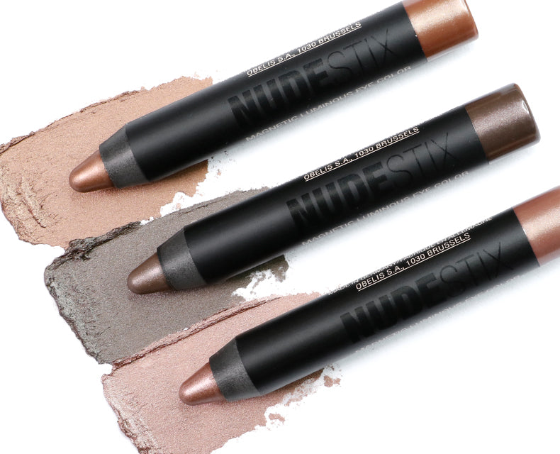 Swatches of eyeshadow pencils in Mini Nude Metallics Eye Kit